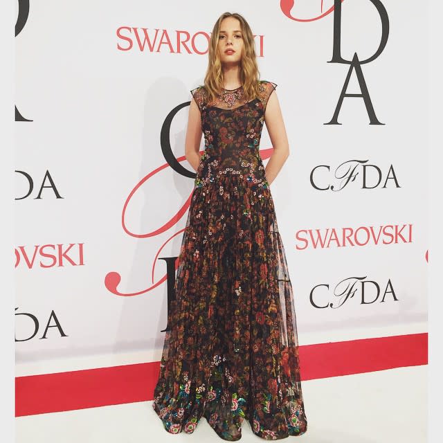 Move over Lily-Rose Depp! Looks like there's another celebrity daughter making a stunning high-fashion debut at one of the fashion world's most high-profile events. Maya Thurman-Hawke, the daughter of Uma Thurman and Ethan Hawke, walked the red carpet at the 2015 CFDA Fashion Awards in New York City on Monday night, looking pretty amazing in a floral Zac Posen dress. Keeping her hair down in a natural waves and showing off her freckles and bright-blue eyes, it's not hard to imagine modeling being effortless for the statuesque teenager. <strong>PHOTOS: A Pregnant Kim Kardashian Wore What to the 2015 CFDA Fashion Awards?!</strong> She was even accompanied by Zac Posen himself, who gushed about Maya on his Instagram. "My gorgeous date tonight," the designer wrote. Best of all, Maya clearly enjoyed herself on the red carpet, twirling around in her designer creation. Getty Images You're only 16 once! <strong>WATCH: Johnny Depp's 15-Year-Old Daughter Lily-Rose Is All Grown Up In a Crop Top</strong> Check out the video below to revisit Uma Thurman's iconic <em>Pulp Fiction</em> role, when ET visited the set a year before the film's release in 1993.