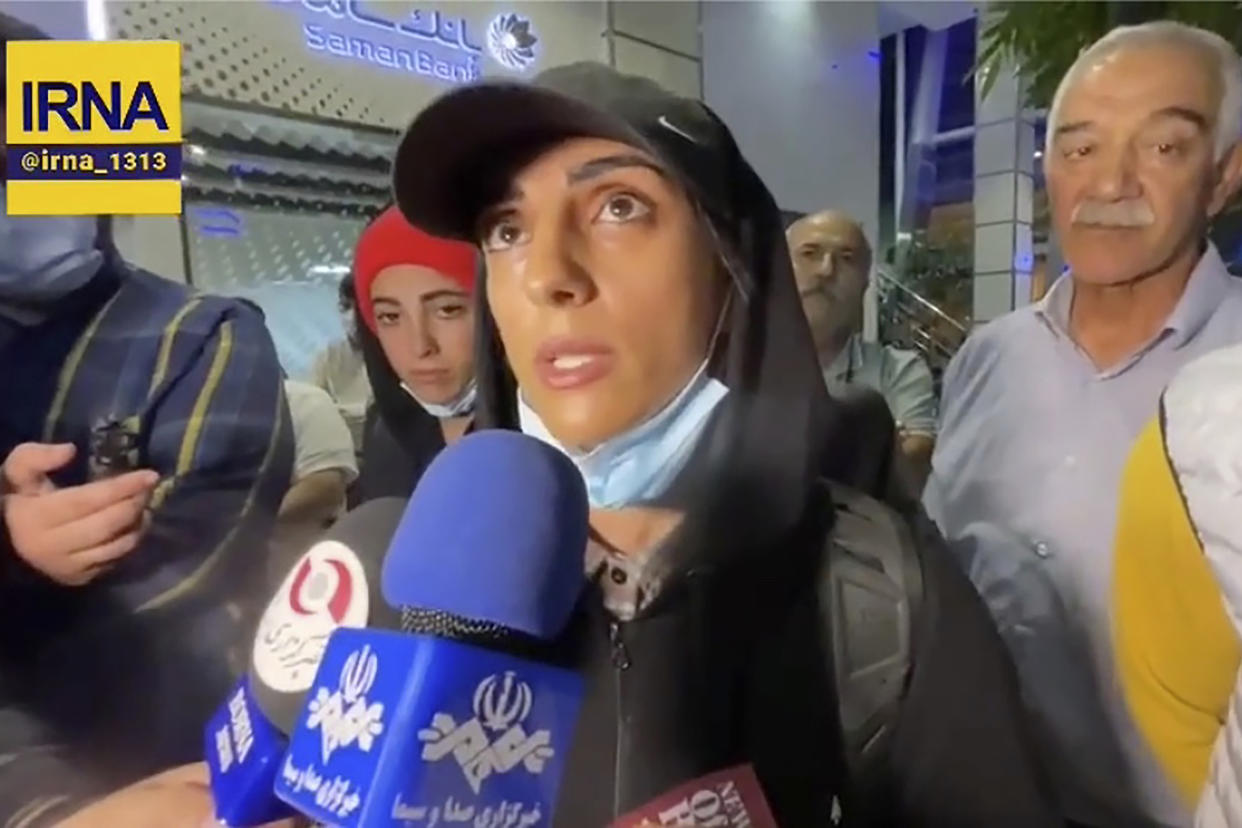Elnaz Rekabi spoke with state-run media when she returned to Iran after not wearing a hijab in South Korea. (IRNA via AP)