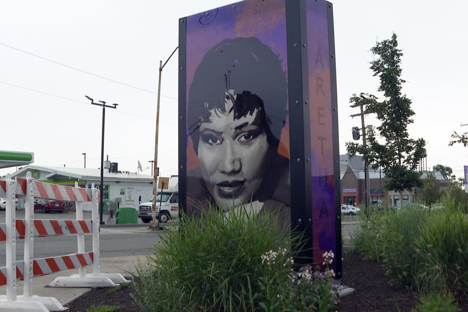 In a frame grab from video a sign showing Aretha Franklin is seen in Detroit on June 15, 2023 two blocks from an amphitheater named after her. Five years after her death, the final wishes of the music superstar are still unsettled. The latest: an unusual trial next Monday to determine which handwritten will, including one found in couch cushions, will guide how her estate is handled. (AP Photo/Mike Householder)