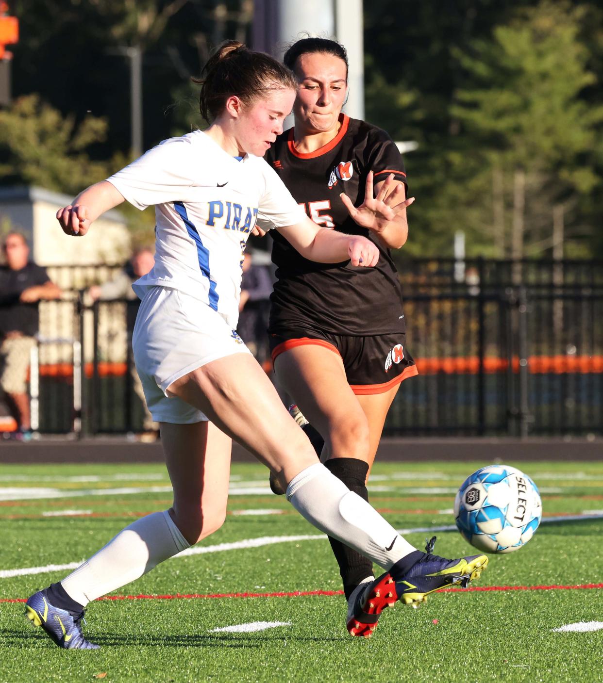 Hull's Veronica Fleming scores a goal next to Middleboro defender Jade Carney during a game on Thursday, Oct. 06, 2022. 
