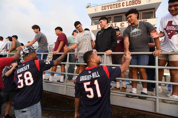 PHOTO: Houston Texans players join the Uvalde football team ahead of the high school's first home game, Sept. 2, 2022. (Todd Wawrychuk/ABC)