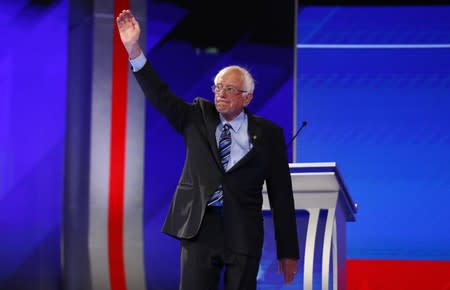 Senator Bernie Sanders takes the stage for the start of the 2020 Democratic U.S. presidential debate in Houston, Texas, U.S.