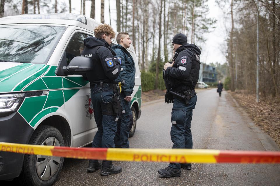 Police officers patrol near the house of Leonid Volkov, a close associate of the late Russian opposition leader Alexei Navalny, in Vilnius, Lithuania, Wednesday, March 13, 2024. Volkov on Wednesday blamed the government of Russian President Vladimir Putin after he was attacked with a hammer and tear gas outside his home near the Lithuanian capital, where he lives in exile, the late Navalny's anti-corruption foundation said.(AP Photo/Mindaugas Kulbis)