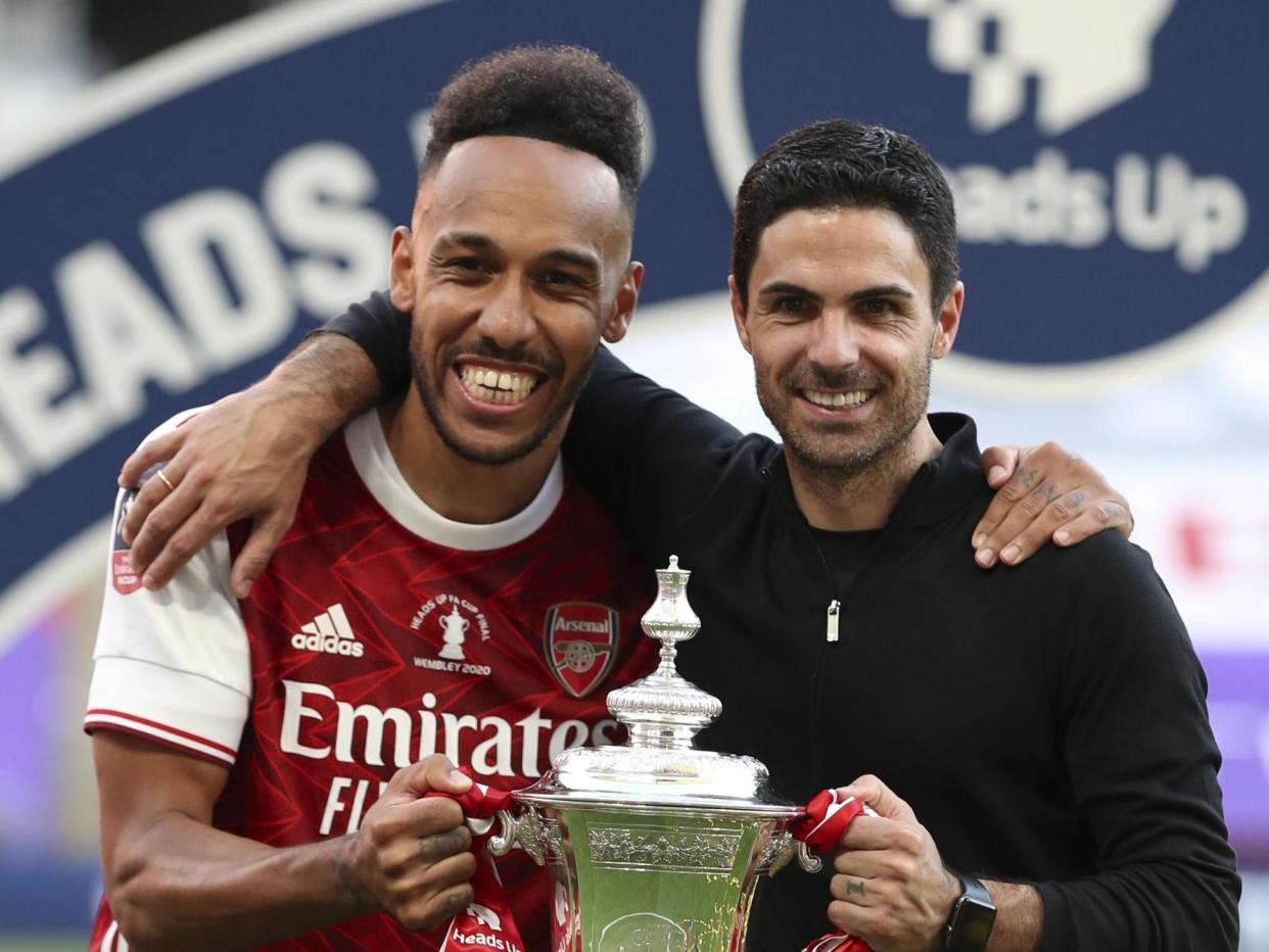 Mikel Arteta (R) and Pierre-Emerick Aubameyang: AP