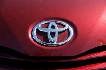 A Toyota logo is seen on a car at City Toyota in Daly City, California, U.S., October 3, 2017. REUTERS/Stephen Lam