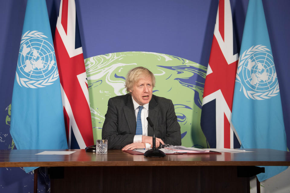 LONDON, ENGLAND - FEBRUARY 23: Prime Minister Boris Johnson chairs a session of the UN Security Council on climate and security at the Foreign, Commonwealth and Development Office on February 23, 2021 in London, England. The United Kingdom holds the security council's rotating presidency and is the host nation of this year's COP26 UN climate summit in Glasgow. (Photo by Stefan Rousseau-WPA Pool/Getty Images)