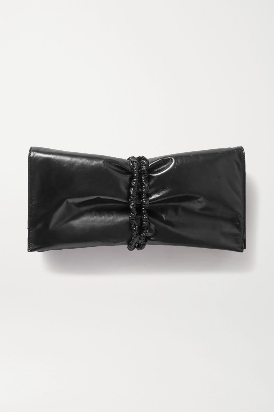 Ruched glossed-leather clutch