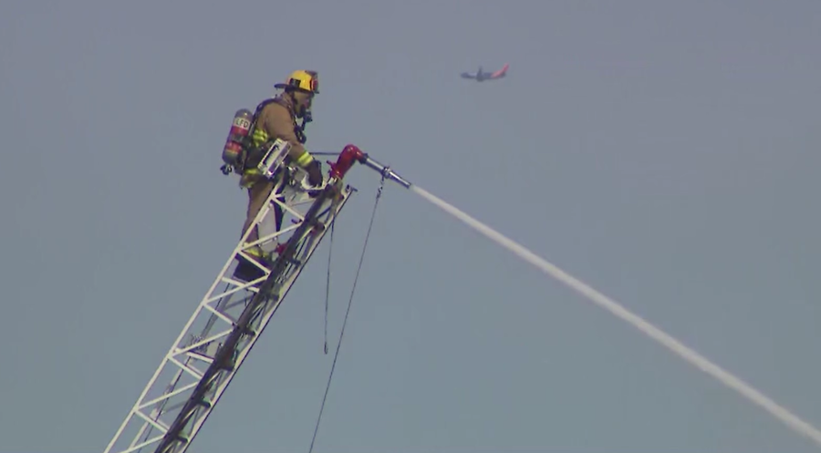 A large fire erupted at a building in L.A.’s Fashion District, sending plumes of smoke billowing into the air across downtown Los Angeles on Mar. 9, 2024. (KTLA)