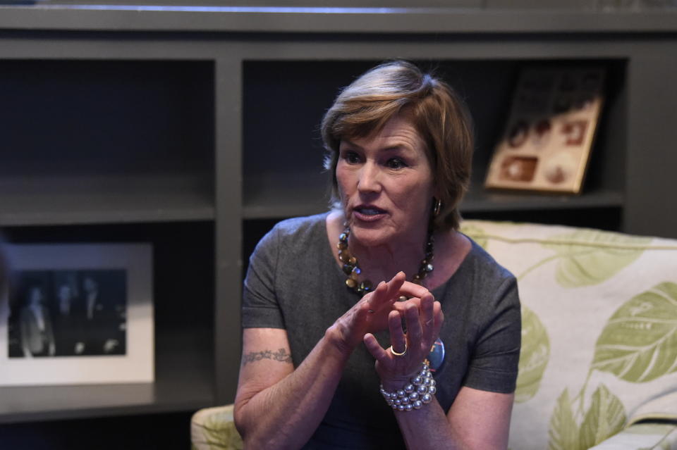 Kat Taylor, wife of Democratic presidential candidate Tom Steyer, speaks with reporters during an open house at the home she's renting in Columbia, S.C., on Sunday, Feb. 16, 2020. (AP Photo/Meg Kinnard)