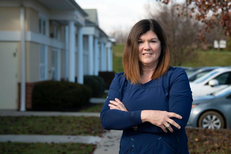 Julie Cassidy, who was among the firsts to be tested for PFAS chemical exposure in the area, poses for a portrait near her workplace in Chalfont on Monday, Dec. 12, 2022.