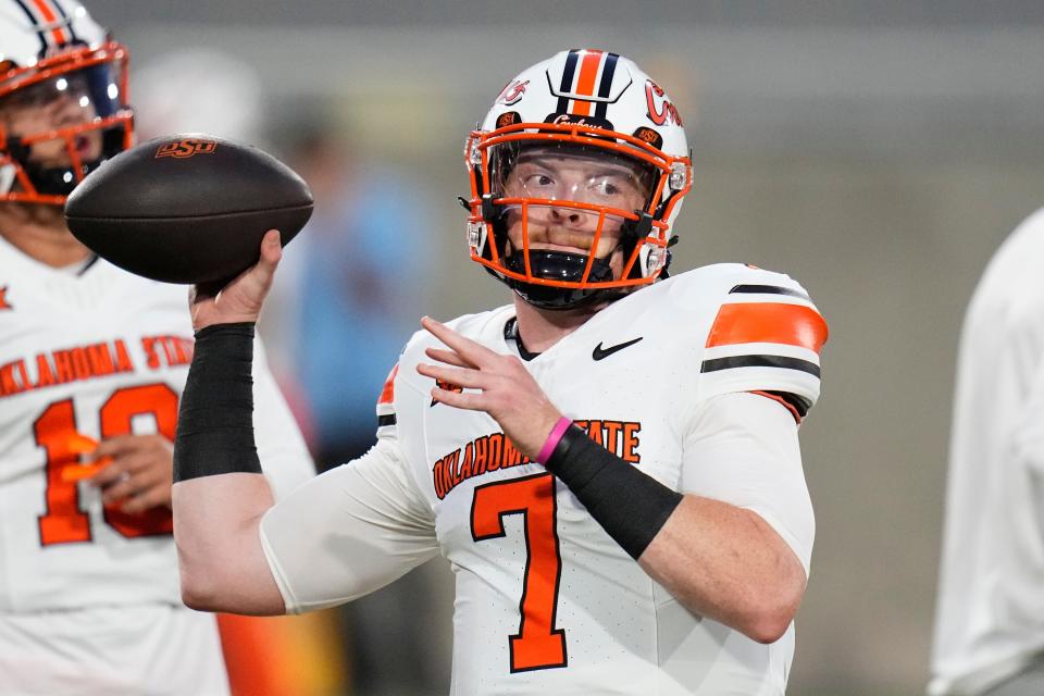 Oklahoma State quarterback Alan Bowman warms up prior to an NCAA college football game against Arizona State Saturday, Sept. 9, 2023, in Tempe, Ariz. (AP Photo/Ross D. Franklin)