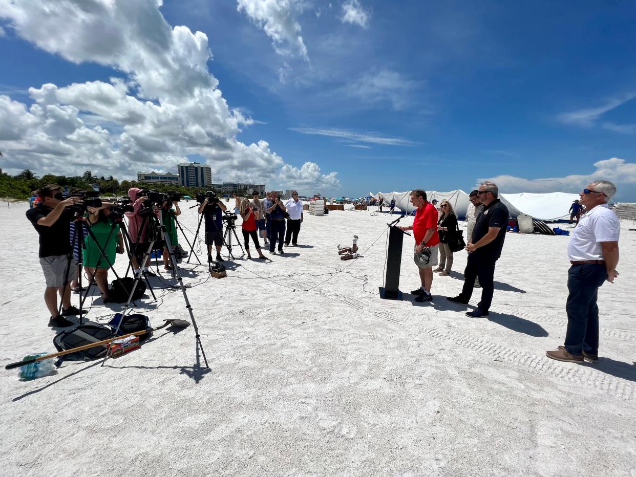 Stephen Leatherman, aka Dr. Beach, adresses the press on Friday to celebrate the passage of a state law that allows local governments to regulate smoking on Florida beaches.