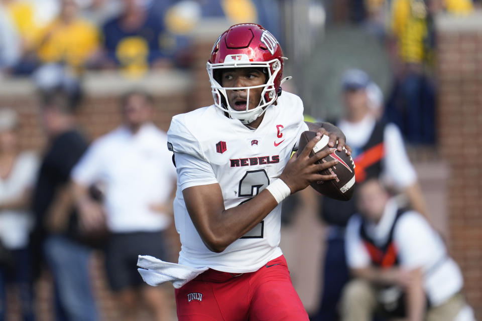 UNLV quarterback Doug Brumfield (2) looks to throw against Michigan in the first half of an NCAA college football game in Ann Arbor, Mich., Saturday, Sept. 9, 2023. (AP Photo/Paul Sancya)