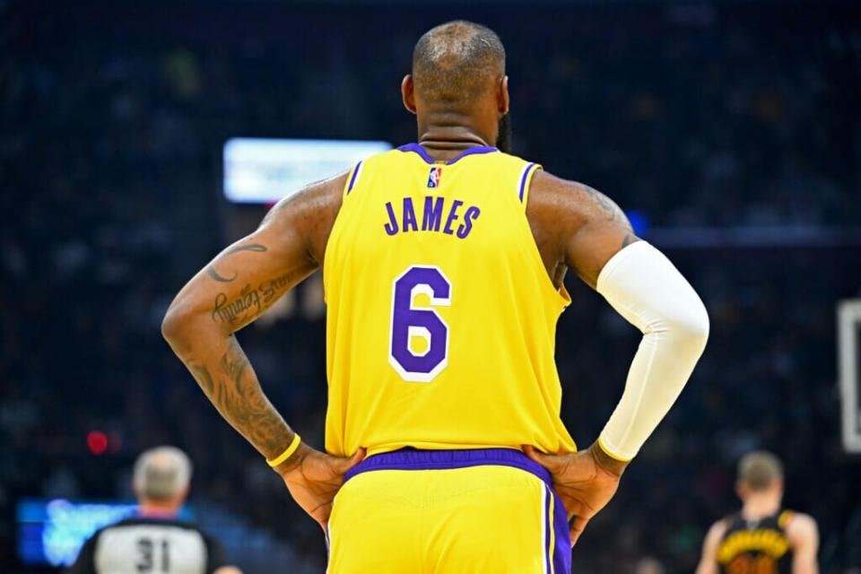 LeBron James #6 of the Los Angeles Lakers pauses on the court during the first quarter against the Cleveland Cavaliers at Rocket Mortgage Fieldhouse on March 21, 2022 in Cleveland, Ohio. (Photo by Jason Miller/Getty Images)