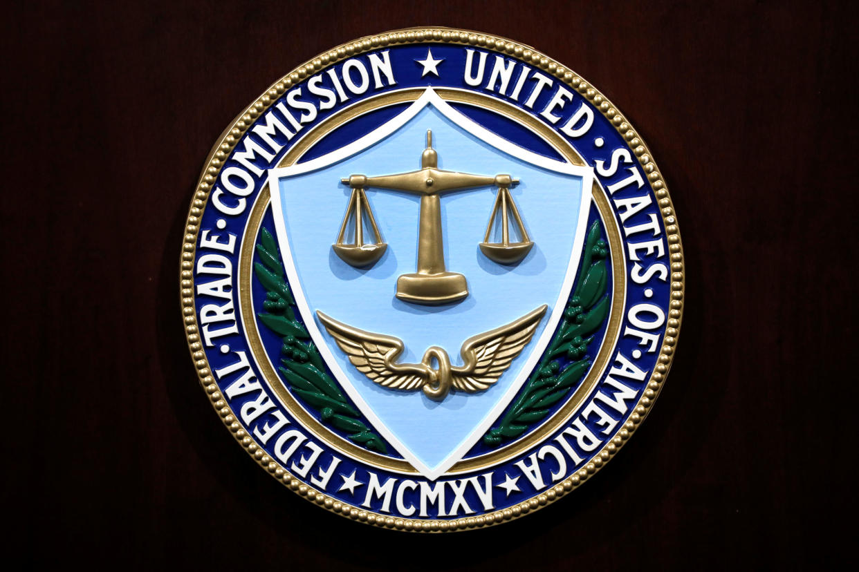 Federal Trade Commission seal is seen at a news conference to announce that Facebook Inc has agreed to a settlement of allegations it mishandled user privacy at FTC Headquarters in Washington, U.S., July 24, 2019. REUTERS/Yuri Gripas