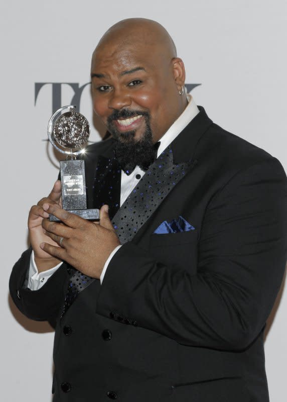 James Monroe Iglehart of "Aladdin," winner of Best Performance by an Actor in a Featured Role in a Musical, holds his Tony Award in the press room during Tony Awards at Radio City Music Hall in New York City in 2014. The Disney musical celebrated 10 years on Broadway this week. File Photo by John Angelillo/UPI