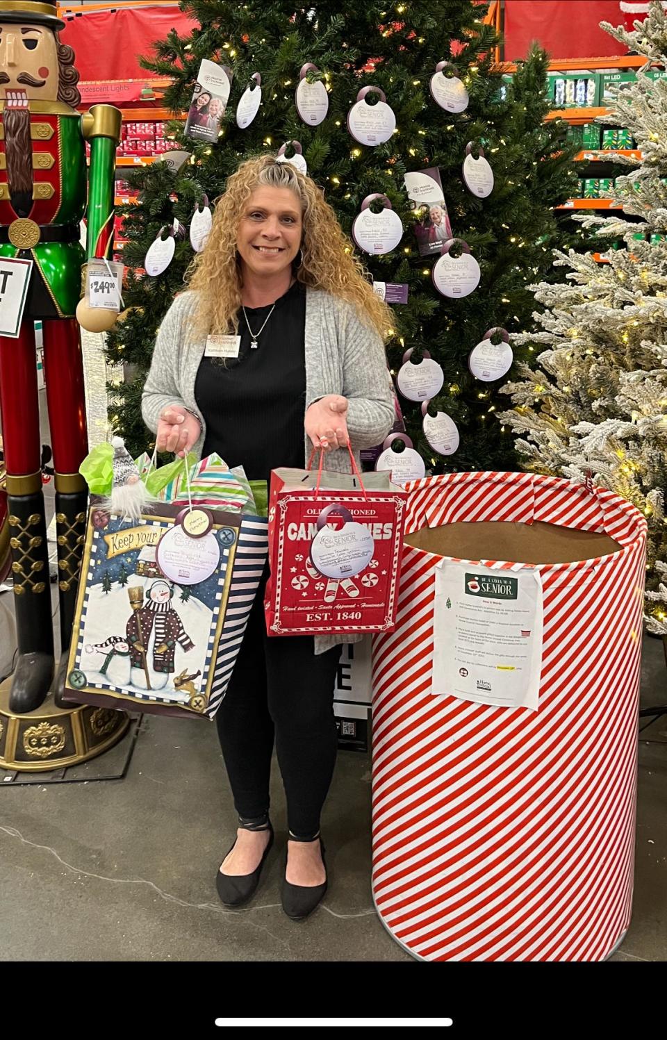 Kathleen Hulsey, home care consultant at Home Instead collected donated gifts dropped off at The Home Depot in Manteca.