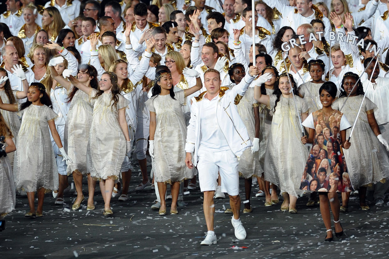 LONDON, ENGLAND - JULY 27:  Sir Chris Hoy of the Great Britain Olympic cycling team carries his country's flag during the Opening Ceremony of the London 2012 Olympic Games at the Olympic Stadium on July 27, 2012 in London, England.  (Photo by Laurence Griffiths/Getty Images)