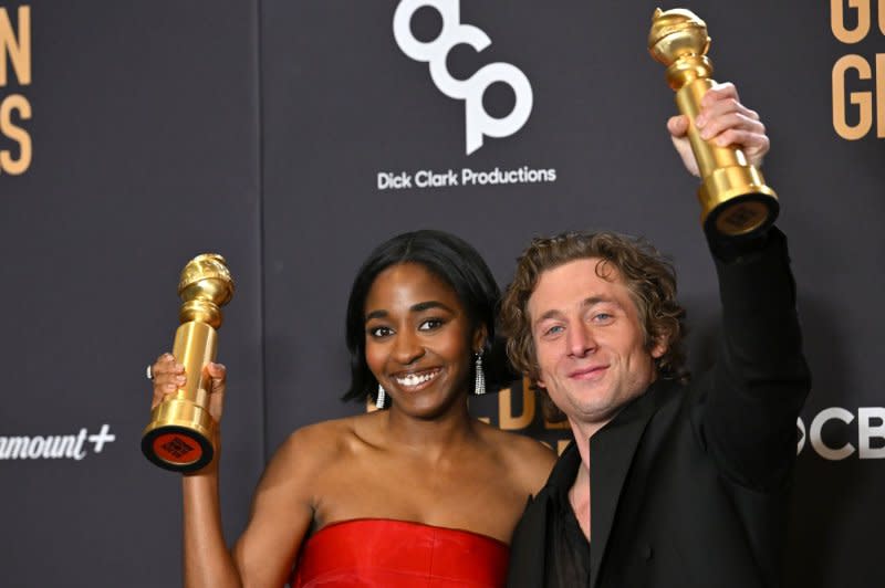 Ayo Edebiri and Jeremy Allen White hold their awards for Best Performance for "The Bear" during the Golden Globe Awards on January 7, 2024. The cast is working on Season 3 of the series. Here are five similar food shows to watch. File Photo by Chris Chew/UPI