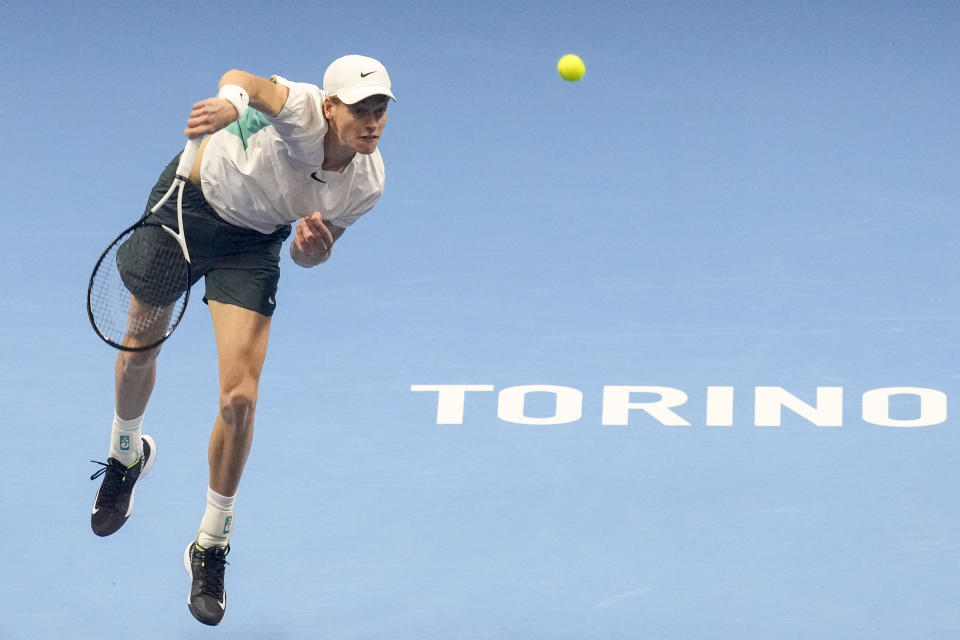 Italy's Jannik Sinner serves to Russia's Daniil Medvedev during their singles semifinal tennis match of the ATP World Tour Finals at the Pala Alpitour, in Turin, Italy, Saturday, Nov. 18, 2023. (AP Photo/Antonio Calanni)