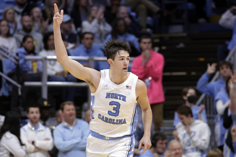 North Carolina guard Cormac Ryan (3) celebrates after shooting a three point shot during the second half of an NCAA college basketball game against Charleston Southern, Friday, Dec. 29, 2023, in Chapel Hill, N.C. (AP Photo/Chris Seward)