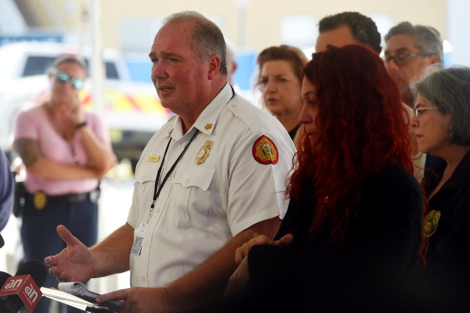 July 9, 2021, Surfside FL, USA; Miami-Dade Fire Rescue Chief Alan Cominsky addresses the media in an afternoon press briefing on Friday, July 9, 2021. One more victim has been found in the rubble of the Champlain Towers South bringing the death toll to 79 with 61 still missing.Mandatory Credit: Patrick Dove/Treasure Coast News via USA Today NETWORK