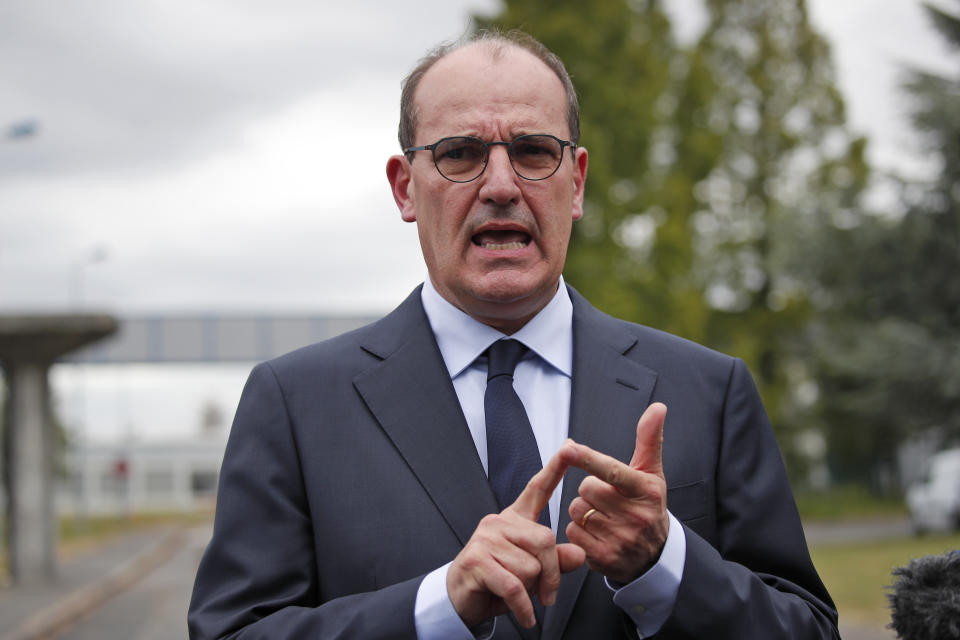 France's new prime minister Jean Castex gives a press conference after he made his first outing in the new job in X-FAB, a semiconductor factory that received extensive government aid to withstand the virus lockdown on its activity in Le Coudray Montceaux, near Paris, Saturday, July 4, 2020. His office chose the X-FAB factory because it's seen as an example of European cooperation and innovation, and the kind of company that will be important to pulling France of out of deep recession and reviving its industrial production. (AP Photo/Francois Mori)