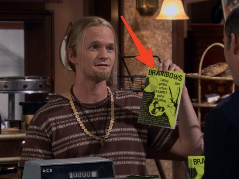 flashback of barney holding a green zine called brainbows on how i met your mother
