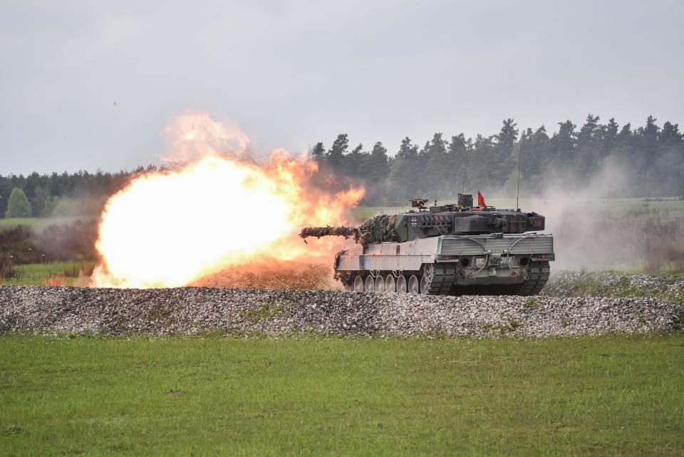 A German Leopard 2A6 tank fires at its target during the Strong Europe Tank Challenge (SETC), at the 7th Army Training Command Grafenwoehr Training Area, Germany, May 12, 2017.