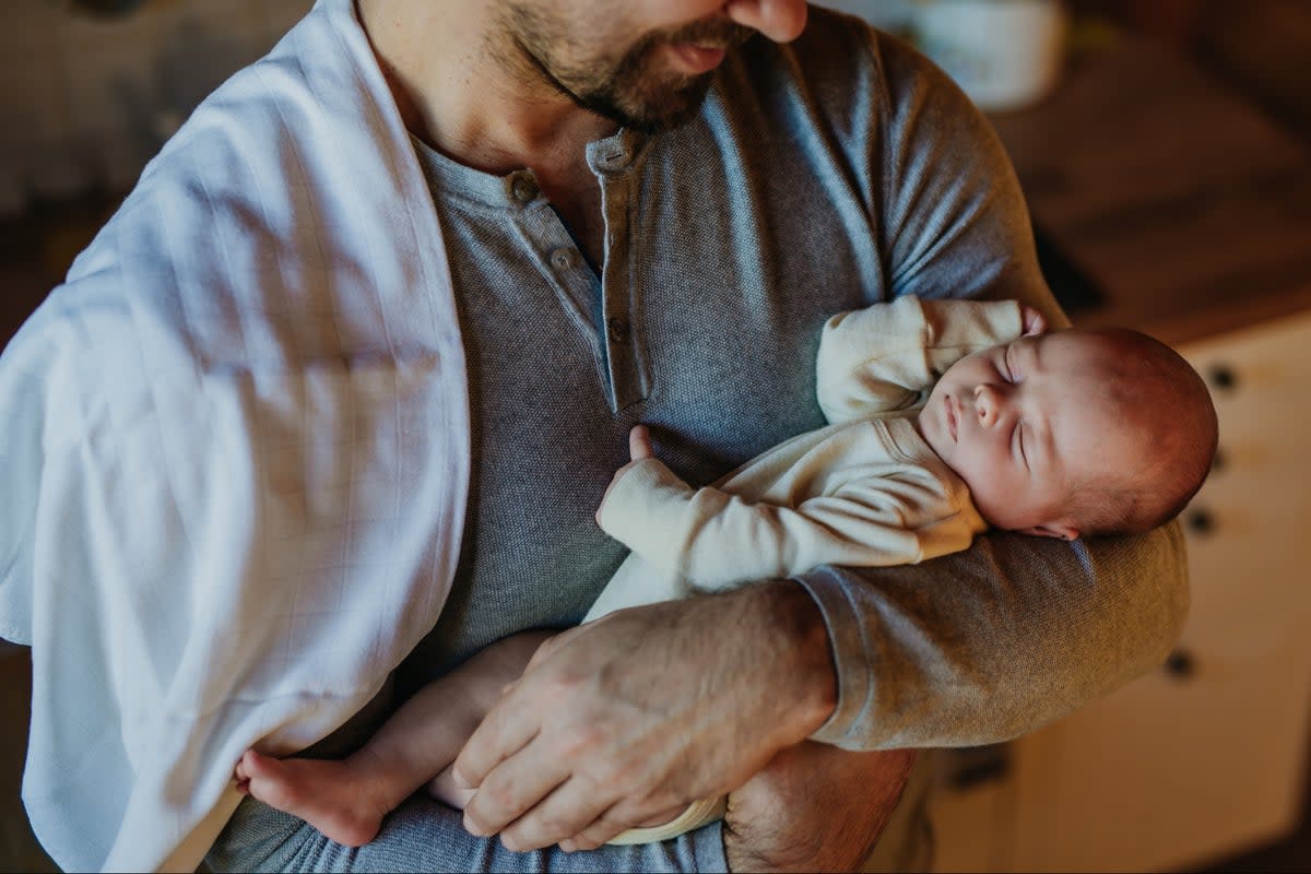 In the UK, most new dads and same-sex partners are entitled to up to two weeks of leave after their baby is born, while in Sweden a couple can get 480 days of paid leave between them  (Getty)