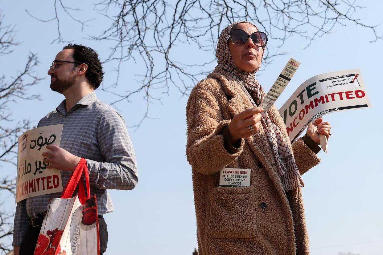 <span>Democratic voters rally outside of a polling location in Dearborn, Michigan, on 27 February 2024.</span><span>Photograph: Kevin Dietsch/Getty Images</span>