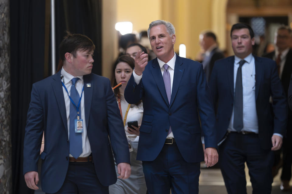 Speaker of the House Kevin McCarthy, R-Calif., walks from the chamber just after the Republican majority in the House narrowly passed a sweeping debt ceiling package as they try to push President Joe Biden into negotiations on federal spending, at the Capitol in Washington, Wednesday, April 26, 2023. (AP Photo/J. Scott Applewhite)