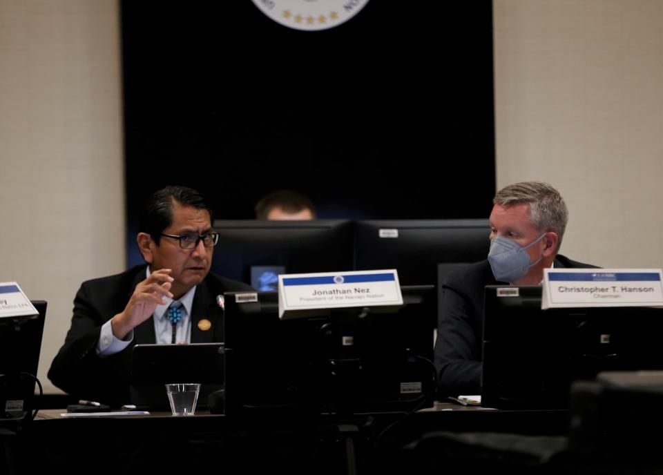 Navajo Nation President Jonathan Nez, left, addresses the U.S. Nuclear Regulatory Commission during the commission's public meeting on April 22 in Gallup to discuss proposed cleanup of uranium mining activities on the Navajo Nation.