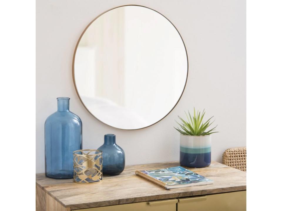 Stylish and functional, this mirror will immediately make a room feel more spaciousMaisons Du Monde