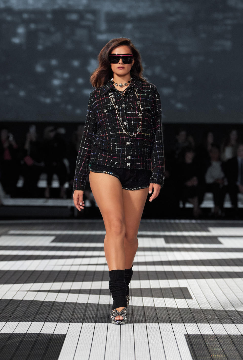 Chanel’s Cruise 2024 Collection Went Sporty With Retro Bikinis, Sneakers and Leg Warmers For Los