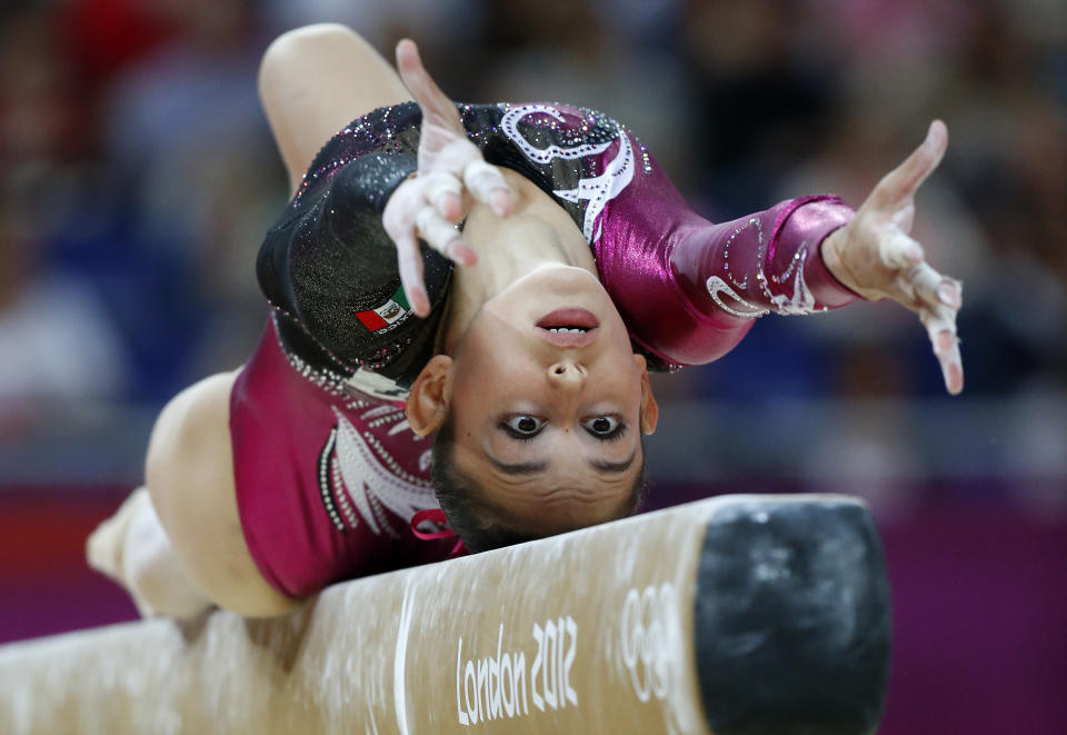 Mexico's gymnast Elsa Garcia Rodriguez Blancas performs on the beam during the women's qualification of the artistic gymnastics event of the London Olympic Games on July 29, 2012 at the 02 North Greenwich Arena in London. AFP PHOTO / THOMAS COEX        (Photo credit should read THOMAS COEX/AFP/GettyImages)