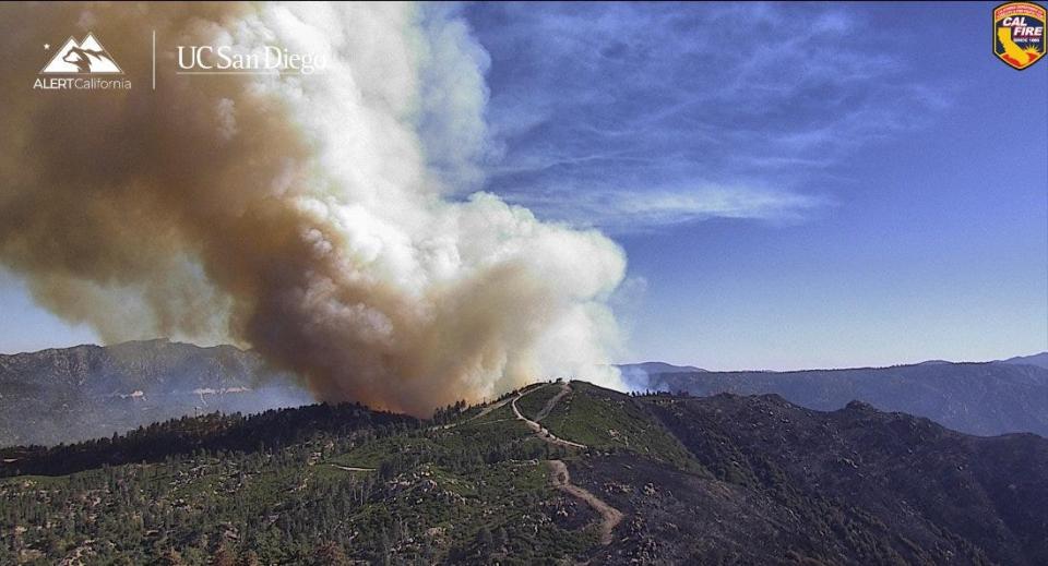 Smoke from the nearly contained Line Fire is seen in the San Bernardino Mountains on Thursday, September 26, 2024.