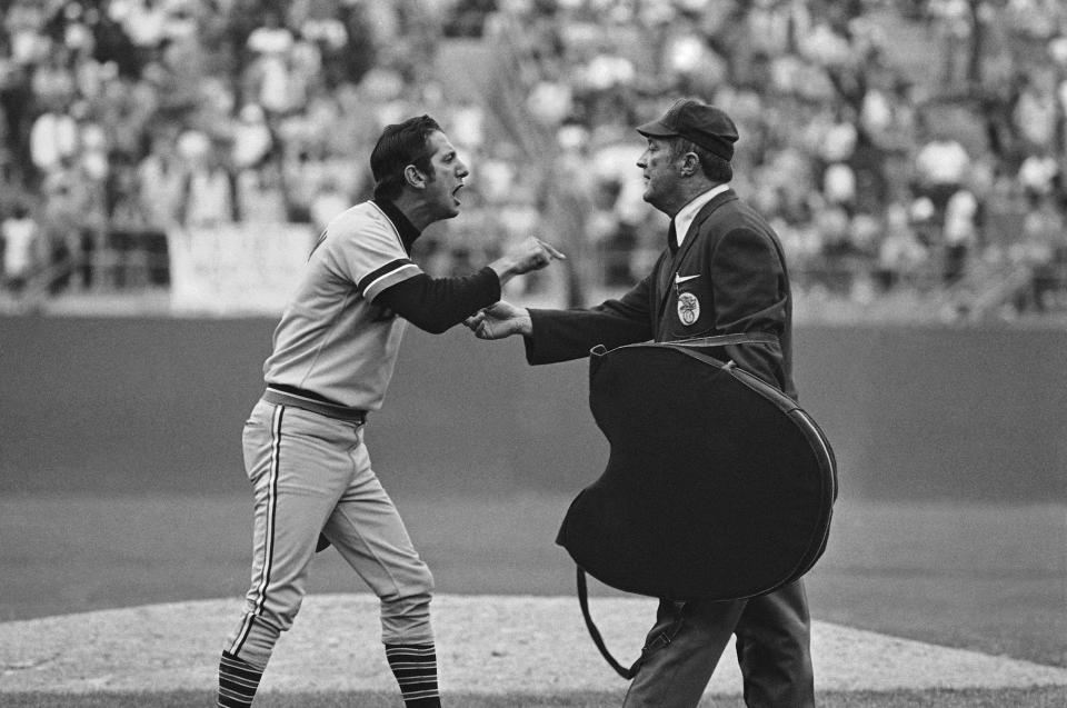 Tigers manager Billy Martin and home plate umpire Nestor Chylak go at it in the seventh inning in Oakland, Oct. 9, 1972, after the A's Bert Campaneris was hit by a Detroit pitch.  Campaneris threw his bat at the pitcher and both players were ejected from the ALCS game. AP FILE PHOTO