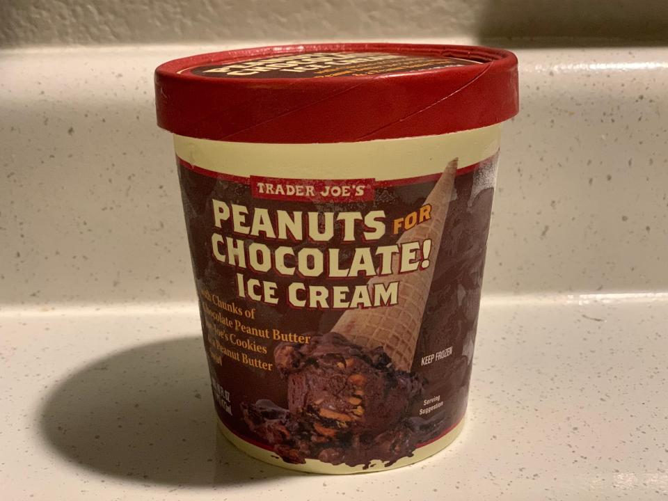 red and brown carton of Trader Joe's peanuts for chocolate ice cream