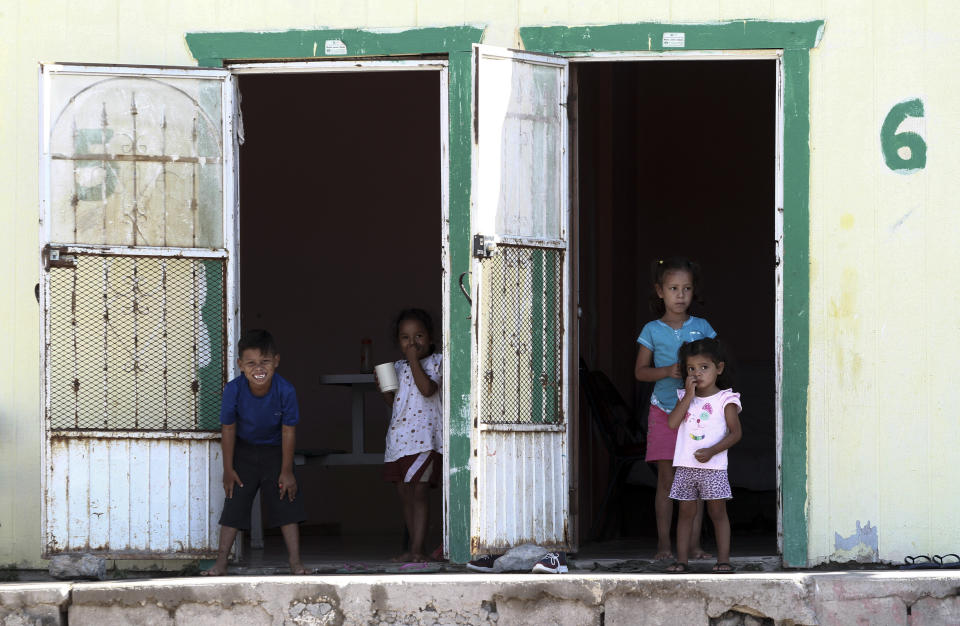 Central American migrant kids pass the time at the Pan de Vida shelter in Ciudad Juarez, Mexico, while waiting with their families to request asylum in the United States, Thursday, Sept. 12, 2019. Mexican Foreign Secretary Marcelo Ebrard said Thursday that Mexico's government doesn't agree with an "astonishing" U.S. Supreme Court order that would block migrants from countries other than Mexico and Canada from applying for asylum at U.S. borders.(AP Photo/Christian Chavez)