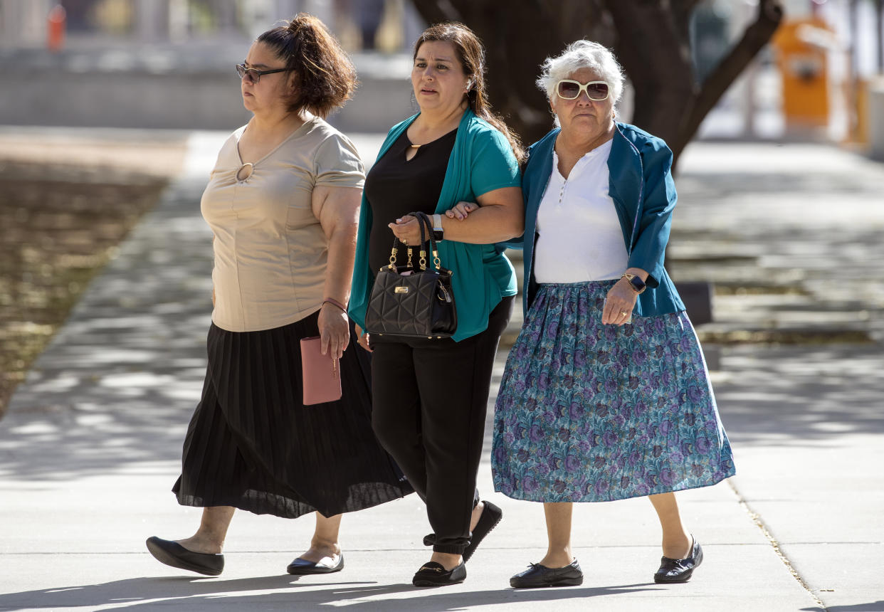 Relatives of victims of the El Paso Walmart mass shooting arrive to federal court in El Paso, Texas, Thursday, July 6, 2023. Nearly four years after a white gunman killed 23 people at a Walmart in El Paso in a racist attack that targeted Hispanic shoppers, relatives of the victims are packing a courtroom near the U.S.-Mexico border this week to see Patrick Crusius punished for one of the nation's worst mass shootings. (AP Photo/Andrés Leighton)