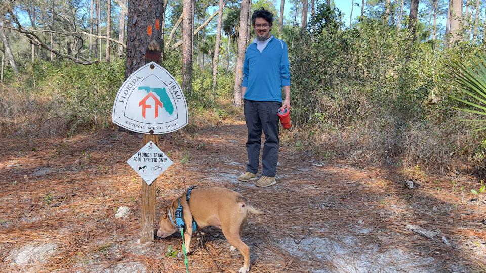 Daniel Veintimilla and terrier Obi Juan navigate the first official portion of the Florida Trail.