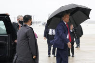 President Donald Trump boards Air Force One for a campaign rally in Sanford, Fla., Monday, Oct. 12, 2020, in Andrews Air Force Base, Md. (AP Photo/Evan Vucci)