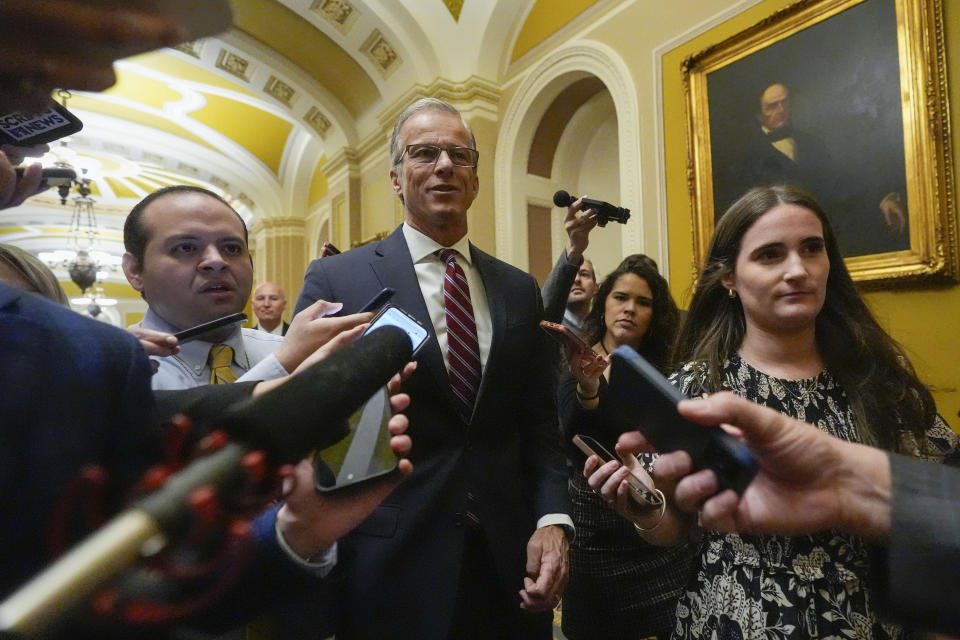 Senate Minority Whip John Thune, R-S.D., is surrounded by members of the media, Wednesday, Feb. 28, 2024, at the Capitol in Washington. Earlier Sen. Mitch McConnell announced that he'll step down as Senate Republican leader in November. (AP Photo/Mark Schiefelbein)