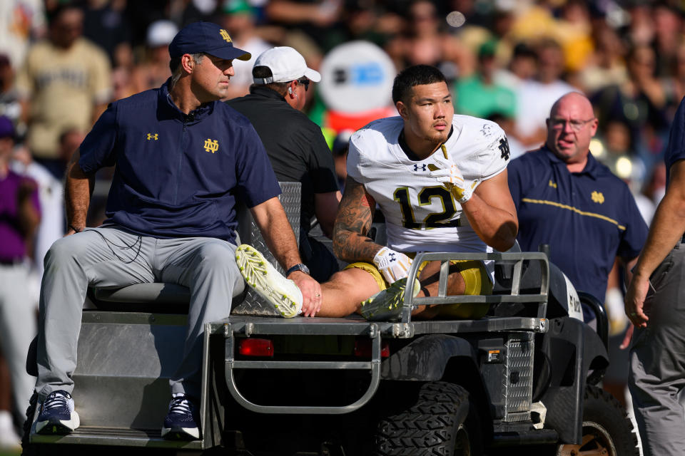 WEST LAFAYETTE, IN - SEPTEMBER 14: Notre Dame Fighting Irish defensive lineman Jordan Botelho (12) gets carted off the field after getting injured during the college football game between the Purdue Boilermakers and Notre Dame Fighting Irish on September 14, 2024, at Ross-Ade Stadium in West Lafayette, IN. (Photo by Zach Bolinger/Icon Sportswire via Getty Images)