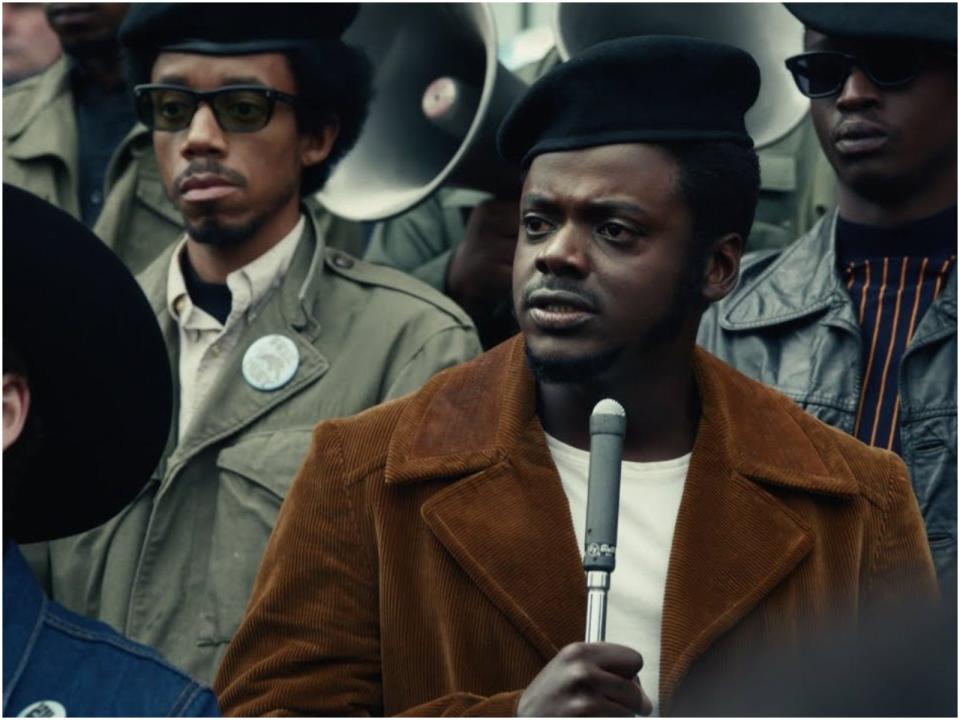 Daniel Kaluuya as Fred Hampton speaking into microphone