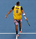 Australia's Nick Kyrgios wears a shirt as a tribute to Kobe Bryant as he warms-up for his fourth round singles match against Spain's Rafael Nadal at the Australian Open tennis championship in Melbourne, Australia, Monday, Jan. 27, 2020.(AP Photo/Andy Wong)