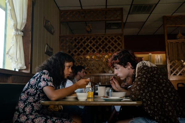 Maren (Taylor Russell) and Lee (Timothée Chalamet) enjoy a different cuisine.<p>Photo: Yannis Drakoulidis/Courtesy of Metro Goldwyn Mayer Pictures</p>