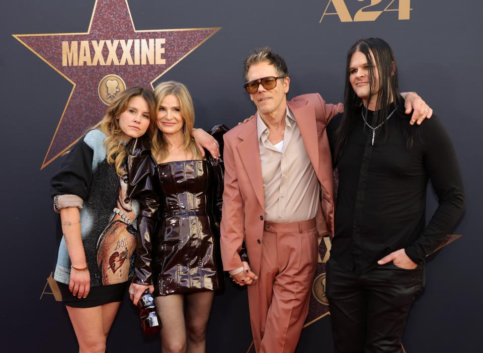 Kevin Bacon, center right, and Kyra Sedgwick, center left, brought their children Sosie, left, and Travis Bacon to the world premiere of "MaXXXine" on Monday.