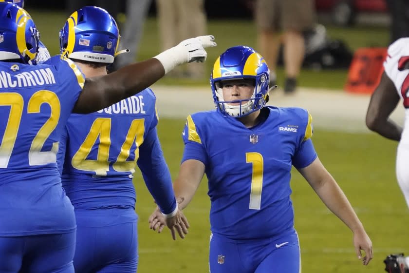 Los Angeles Rams kicker Sam Sloman (1) is greetd by teammted after kicking against the San Francisco 49ers during an NFL football game in Santa Clara, Calif., Sunday, Oct. 18, 2020. (AP Photo/Tony Avelar. (AP Photo/Tony Avelar)